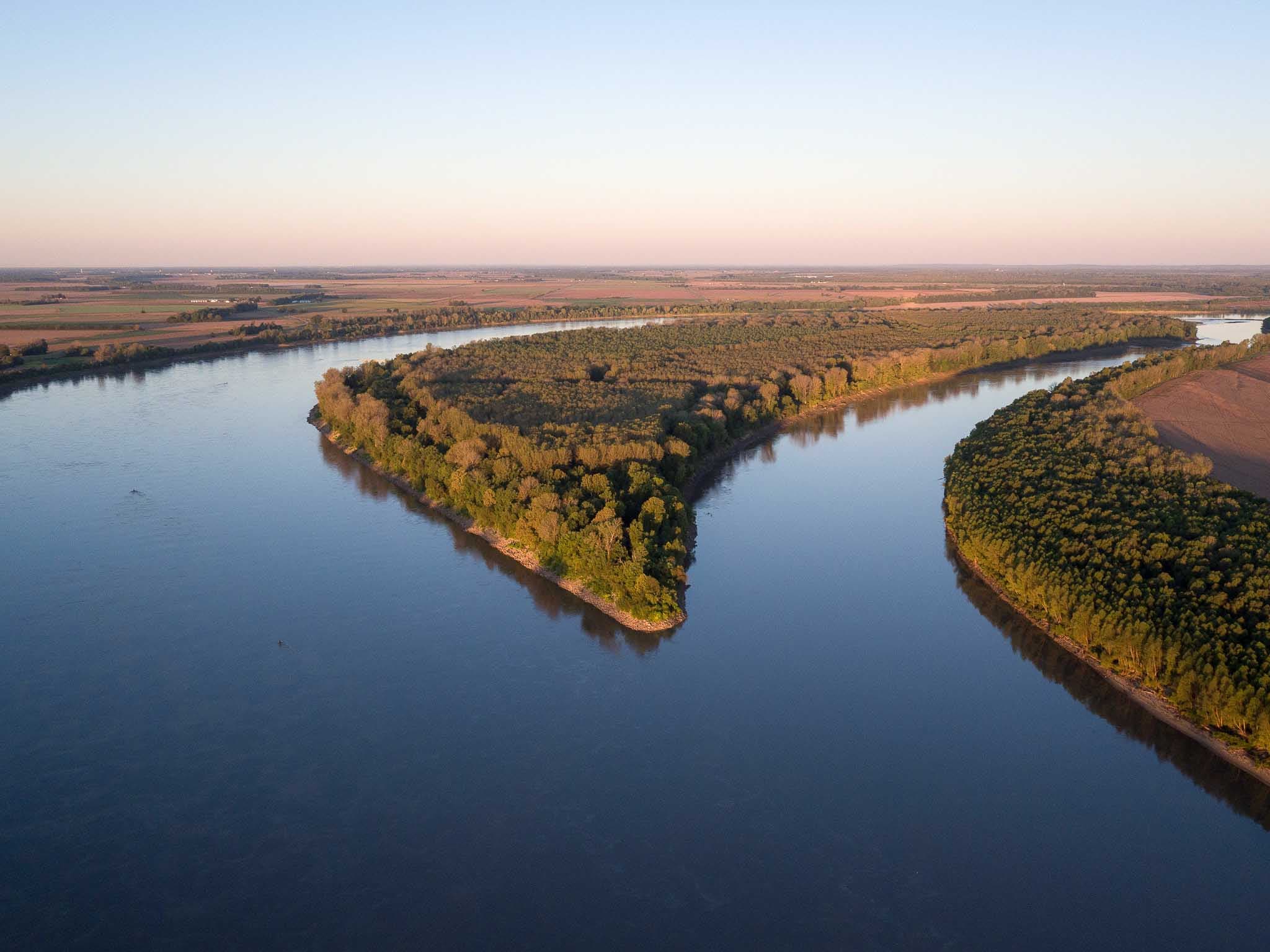 A river winding through a forested landscape